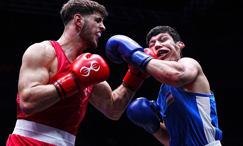 Teagn Scott, Akmaljon Isroilov