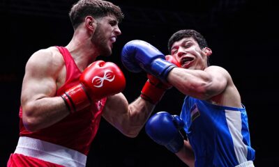 Teagn Scott, Akmaljon Isroilov