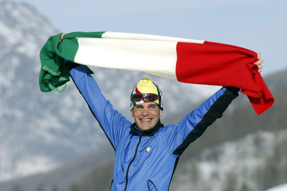 OLIMPIADI INVERNALI - TORINO 2006. L'ITALIANO PIETRO PILLER VINCITORE DELLA MEDAGLIA DI BRONZO NELLA 30KM DI FONDO.
