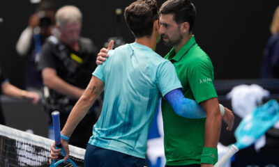 Lorenzo Musetti e Novak Djokovic