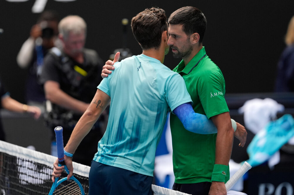 Lorenzo Musetti e Novak Djokovic