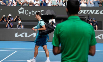 Lorenzo Musetti e Novak Djokovic