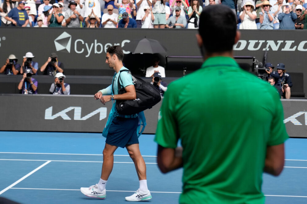 Lorenzo Musetti e Novak Djokovic