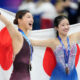 Kaori Sakamoto of Japan, left, and bronze medalist Ami Nakai
